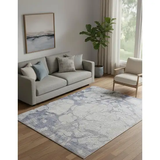 Ivory And Blue Abstract Power Loom Distressed Area Rug Photo 1
