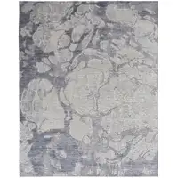 Photo of Ivory And Blue Abstract Power Loom Distressed Area Rug