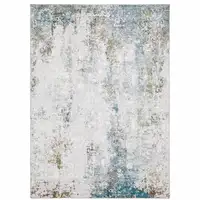Photo of Ivory And Blue Abstract Printed Stain Resistant Non Skid Area Rug