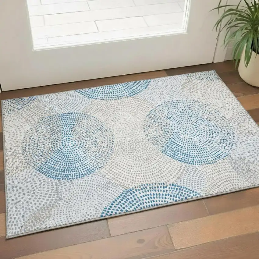 Ivory And Blue Abstract Washable Area Rug With UV Protection Photo 1
