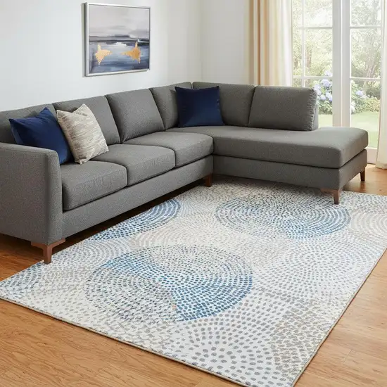 Ivory And Blue Abstract Washable Area Rug With UV Protection Photo 1