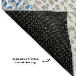 Photo of Ivory And Blue Abstract Washable Area Rug With UV Protection