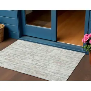 Photo of Ivory And Blue Abstract Washable Indoor Outdoor Area Rug