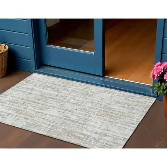 Ivory And Blue Abstract Washable Indoor Outdoor Area Rug Photo 1