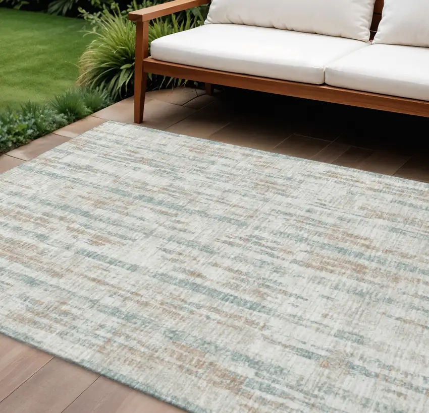Ivory And Blue Abstract Washable Indoor Outdoor Area Rug Photo 1