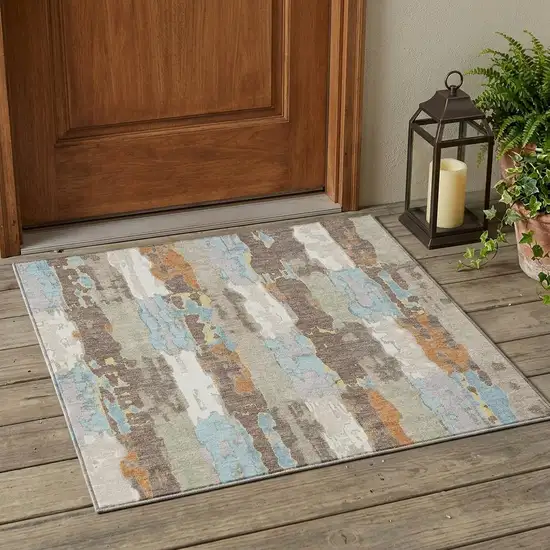 Ivory And Blue Abstract Washable Indoor Outdoor Area Rug Photo 1