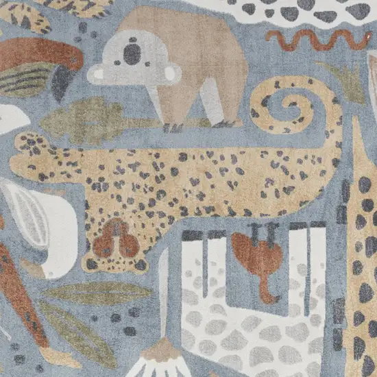 Ivory And Blue Animal Print Area Rug Photo 9