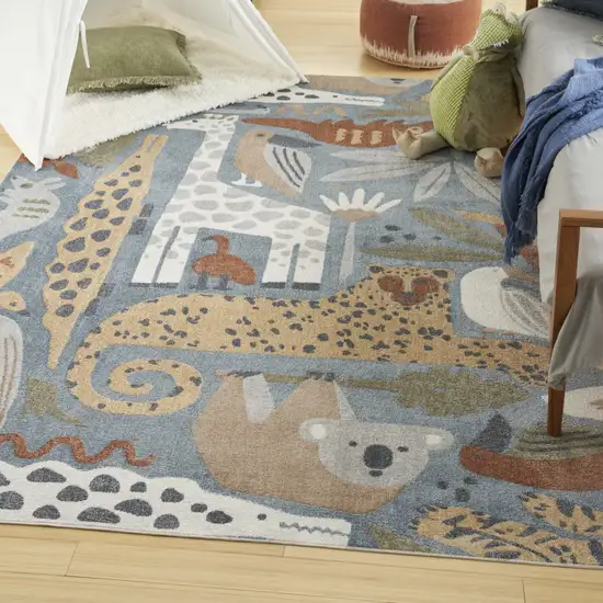 Ivory And Blue Animal Print Area Rug Photo 5