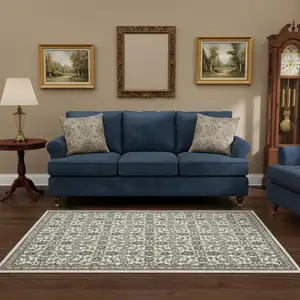 Photo of Ivory And Blue Floral Area Rug With Fringe