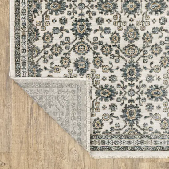 Ivory And Blue Floral Area Rug With Fringe Photo 8
