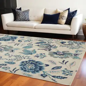 Photo of Ivory And Blue Floral Area Rug