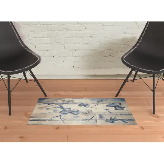 Ivory And Blue Floral Area Rug Photo 1