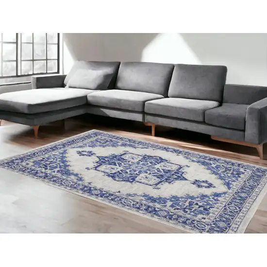 Ivory And Blue Floral Distressed Area Rug Photo 1