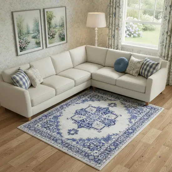 Ivory And Blue Floral Distressed Area Rug Photo 1