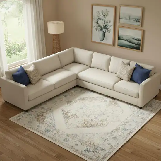 Ivory And Blue Geometric Area Rug Photo 1