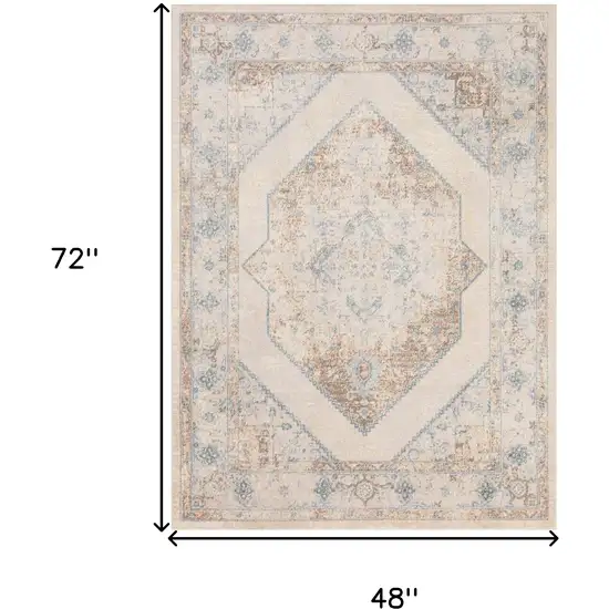 Ivory And Blue Geometric Area Rug Photo 3