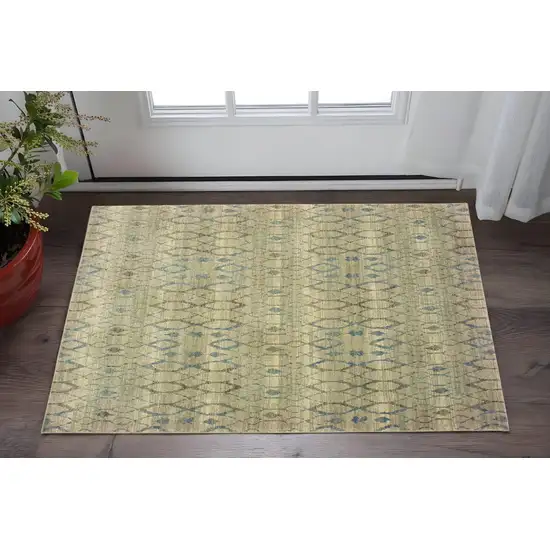 Ivory And Blue Geometric Area Rug Photo 1