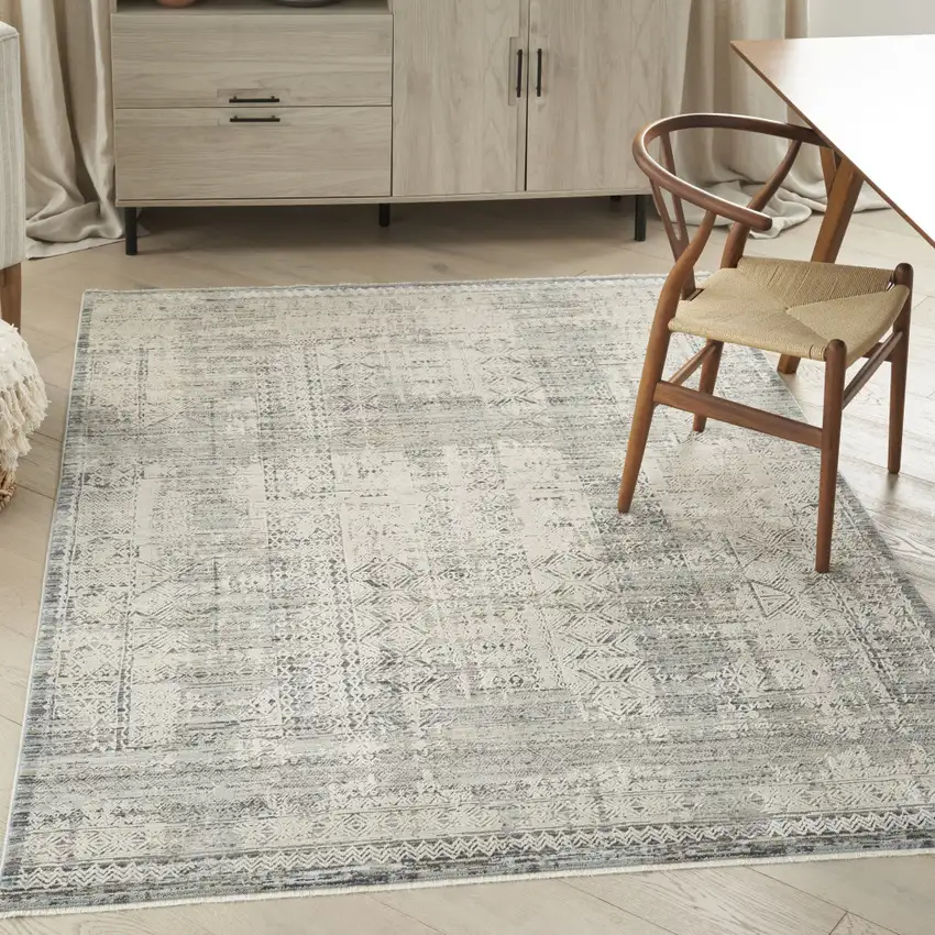 Ivory And Blue Geometric Distressed Area Rug With Fringe Photo 4