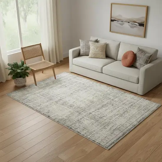 Ivory And Blue Geometric Distressed Area Rug With Fringe Photo 1