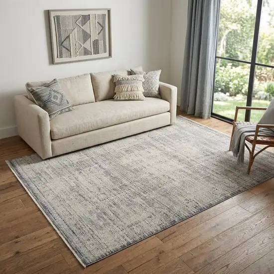 Ivory And Blue Geometric Distressed Area Rug With Fringe Photo 1