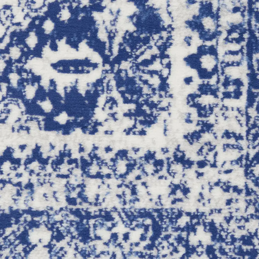Ivory And Blue Geometric Distressed Area Rug Photo 3