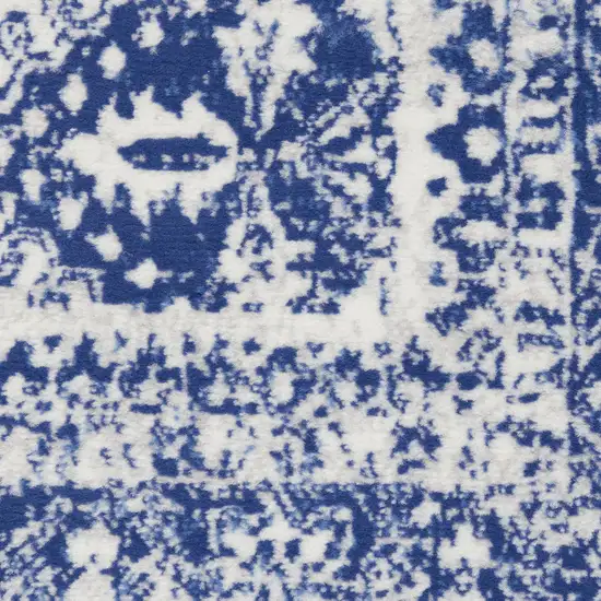 Ivory And Blue Geometric Distressed Area Rug Photo 3