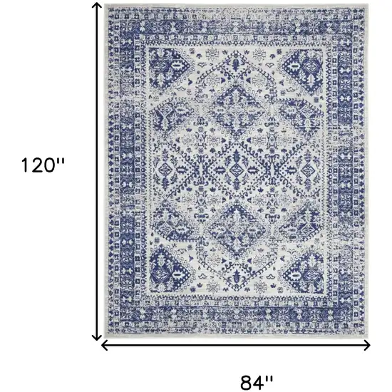 Ivory And Blue Geometric Distressed Area Rug Photo 3