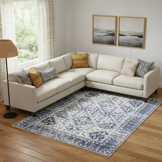 Ivory And Blue Geometric Distressed Area Rug Photo 1