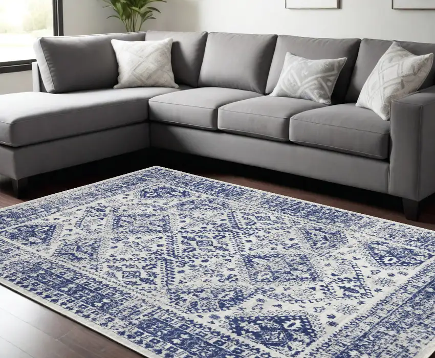 Ivory And Blue Geometric Distressed Area Rug Photo 1