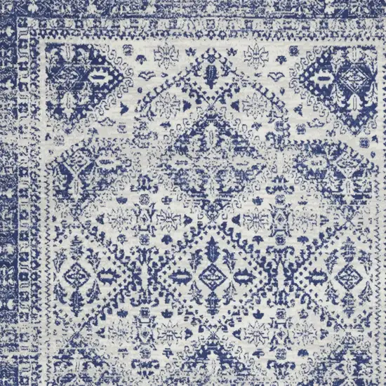 Ivory And Blue Geometric Distressed Area Rug Photo 7