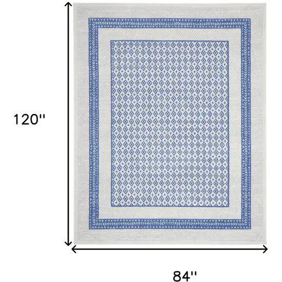 Ivory And Blue Geometric Distressed Area Rug Photo 3