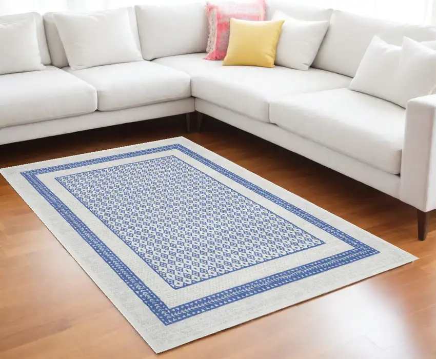 Ivory And Blue Geometric Distressed Area Rug Photo 1