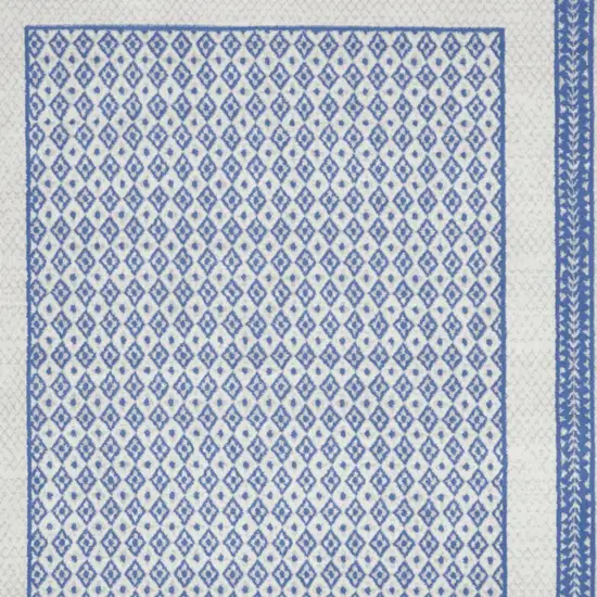 Ivory And Blue Geometric Distressed Area Rug Photo 8