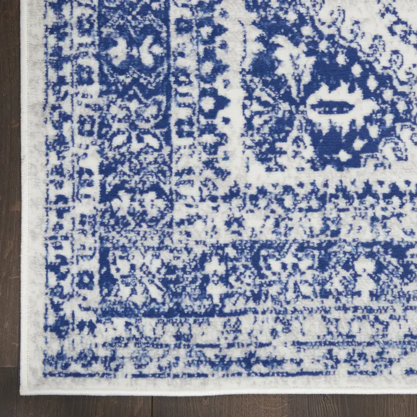 Ivory And Blue Geometric Distressed Area Rug Photo 9