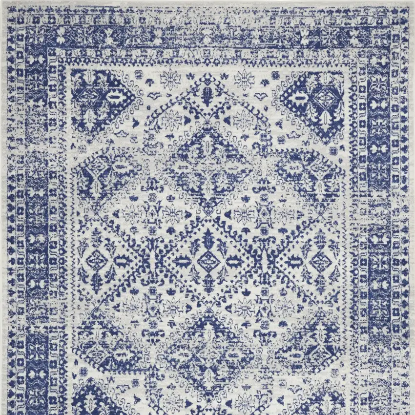 Ivory And Blue Geometric Distressed Area Rug Photo 8