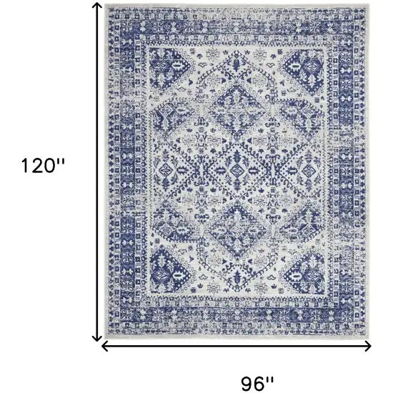 Ivory And Blue Geometric Distressed Area Rug Photo 3
