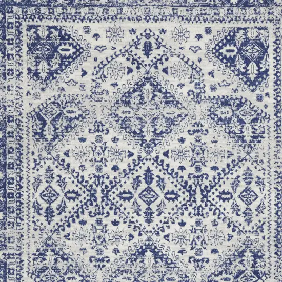 Ivory And Blue Geometric Distressed Area Rug Photo 7