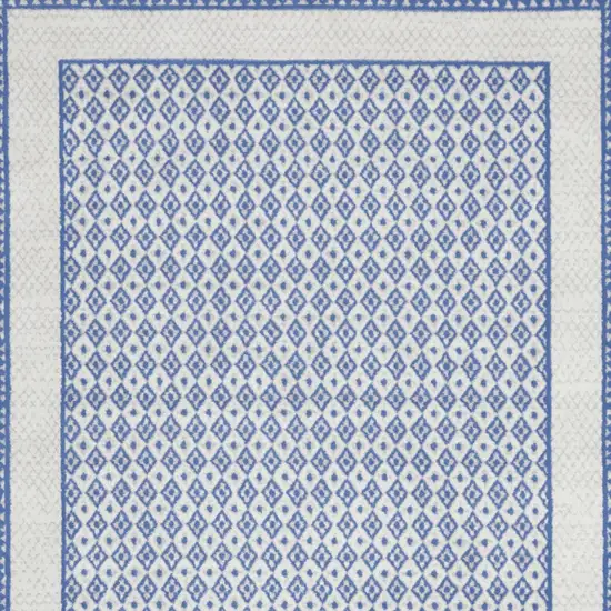 Ivory And Blue Geometric Distressed Area Rug Photo 8