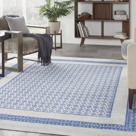 Ivory And Blue Geometric Distressed Area Rug Photo 5
