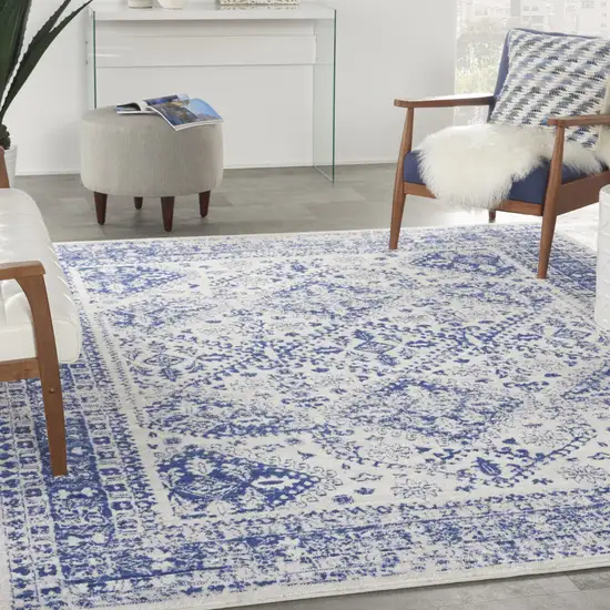Ivory And Blue Geometric Distressed Area Rug Photo 5