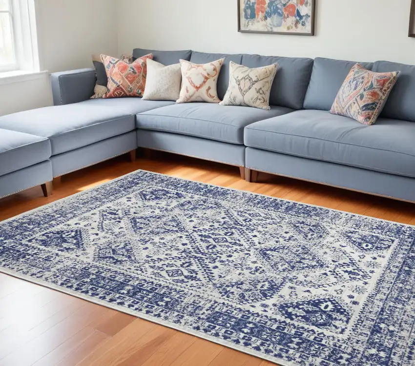 Ivory And Blue Geometric Distressed Area Rug Photo 1
