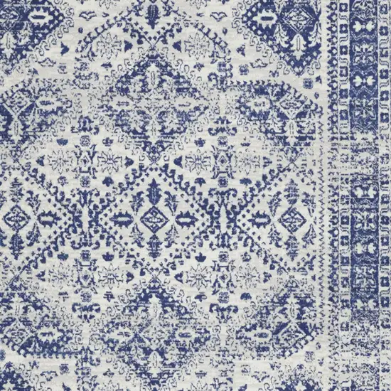 Ivory And Blue Geometric Distressed Area Rug Photo 8