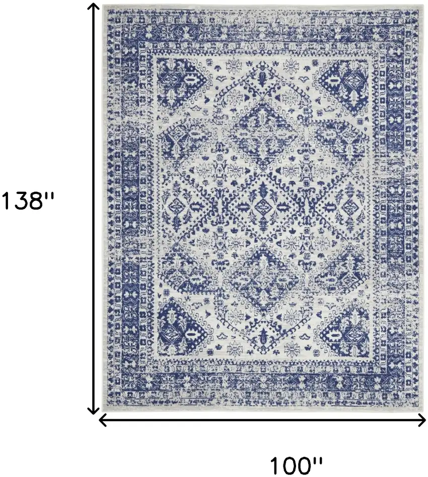 Ivory And Blue Geometric Distressed Area Rug Photo 3