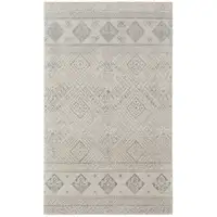 Photo of Ivory And Blue Geometric Power Loom Distressed Area Rug
