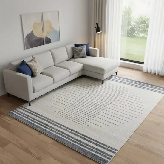 Ivory And Blue Geometric Washable Area Rug Photo 1