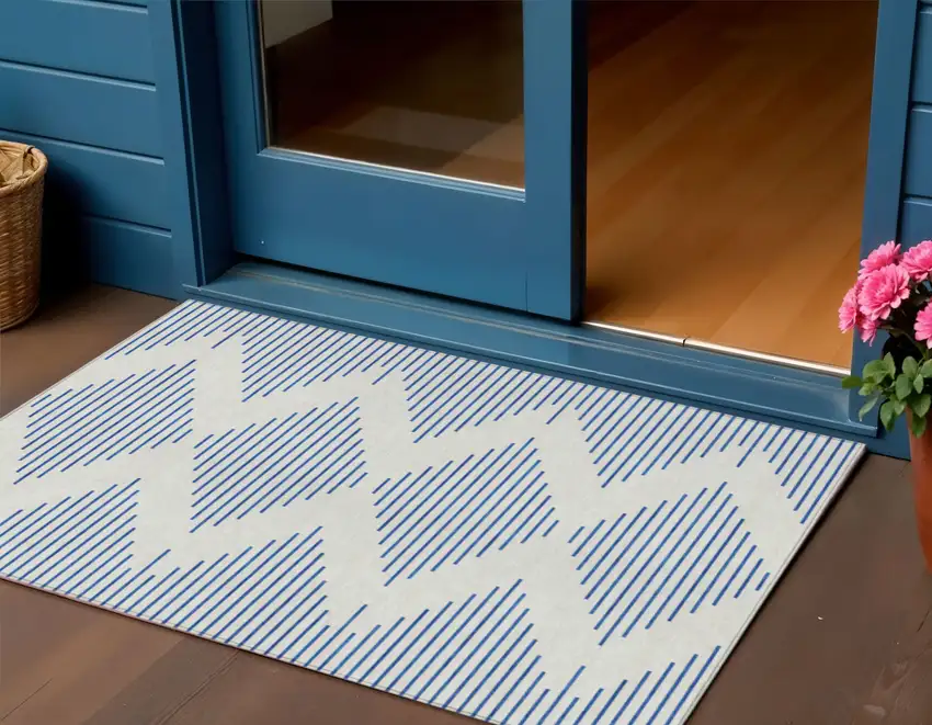 Ivory And Blue Geometric Washable Indoor Outdoor Area Rug Photo 1