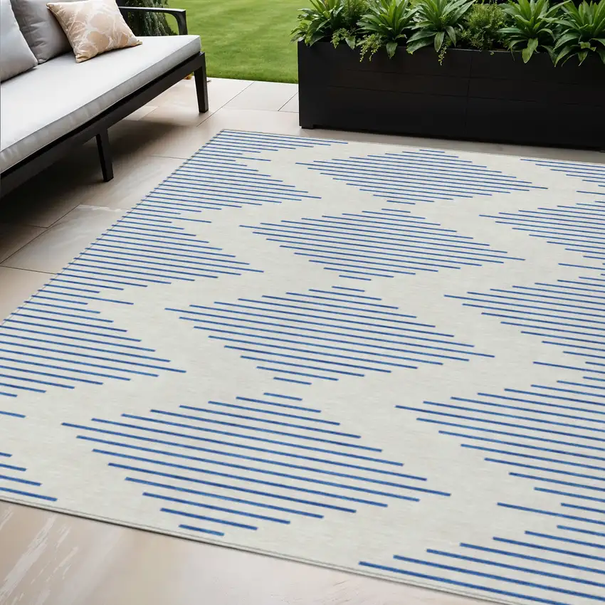 Ivory And Blue Geometric Washable Indoor Outdoor Area Rug Photo 1