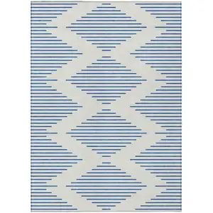 Photo of Ivory And Blue Geometric Washable Indoor Outdoor Area Rug