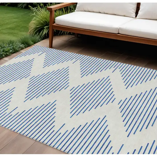 Ivory And Blue Geometric Washable Indoor Outdoor Area Rug Photo 1