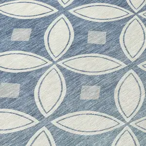 Photo of Ivory And Blue Geometric Washable Indoor Outdoor Area Rug